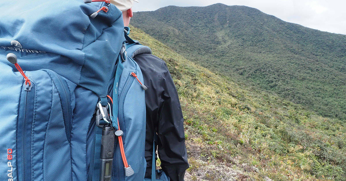 Man hiking with a data logger